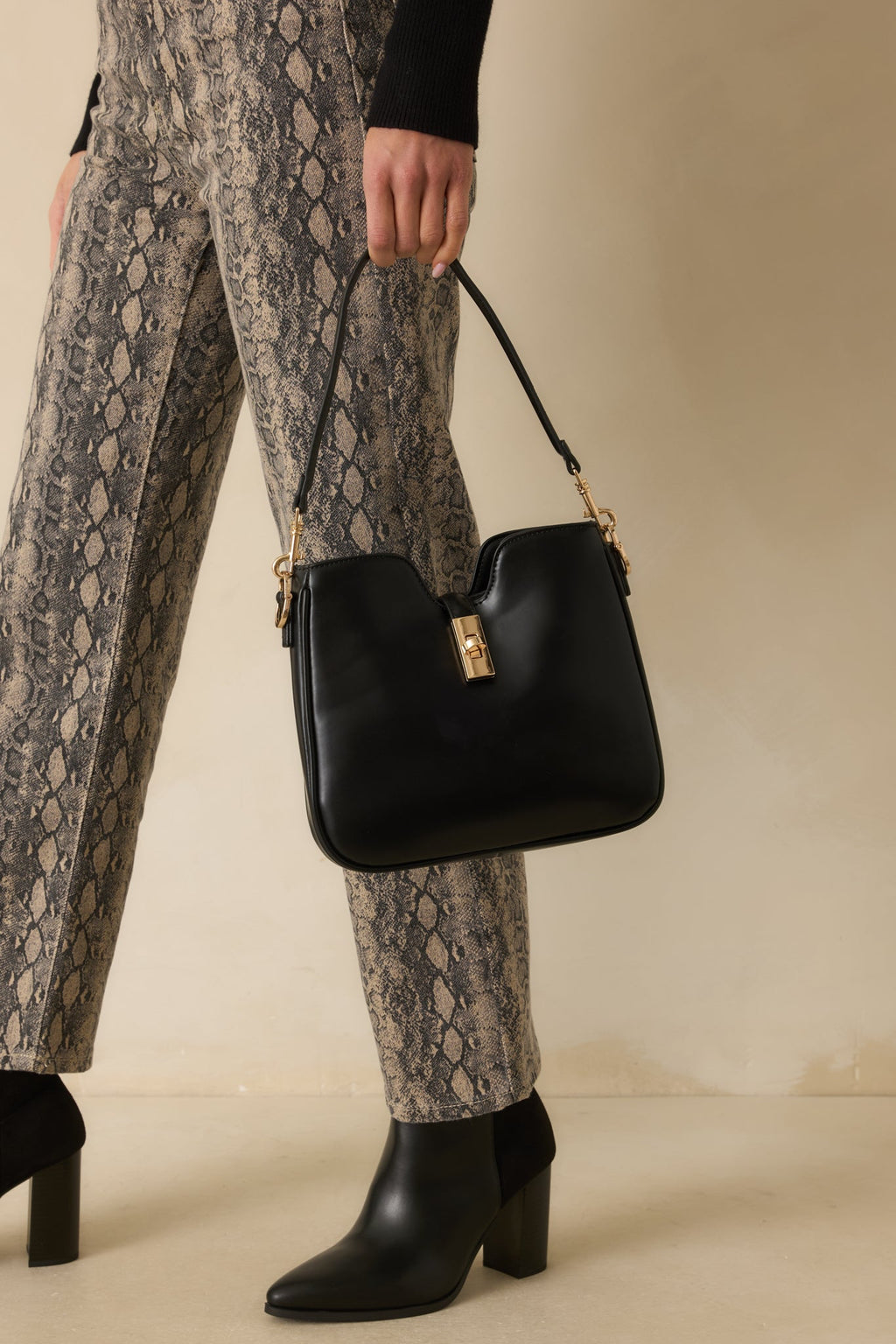 Might Surprise You Black Faux Leather Twist Lock Handbag