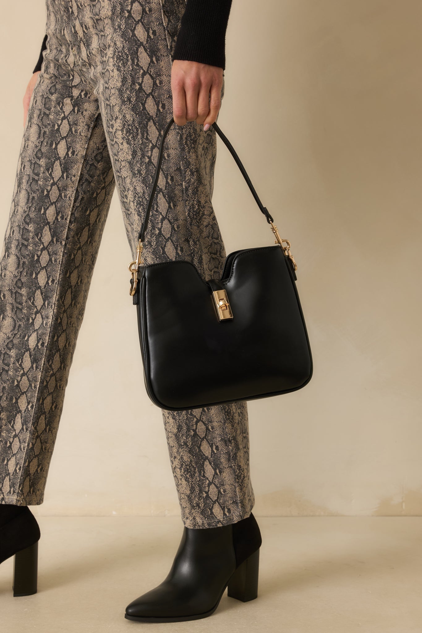 Might Surprise You Black Faux Leather Twist Lock Handbag