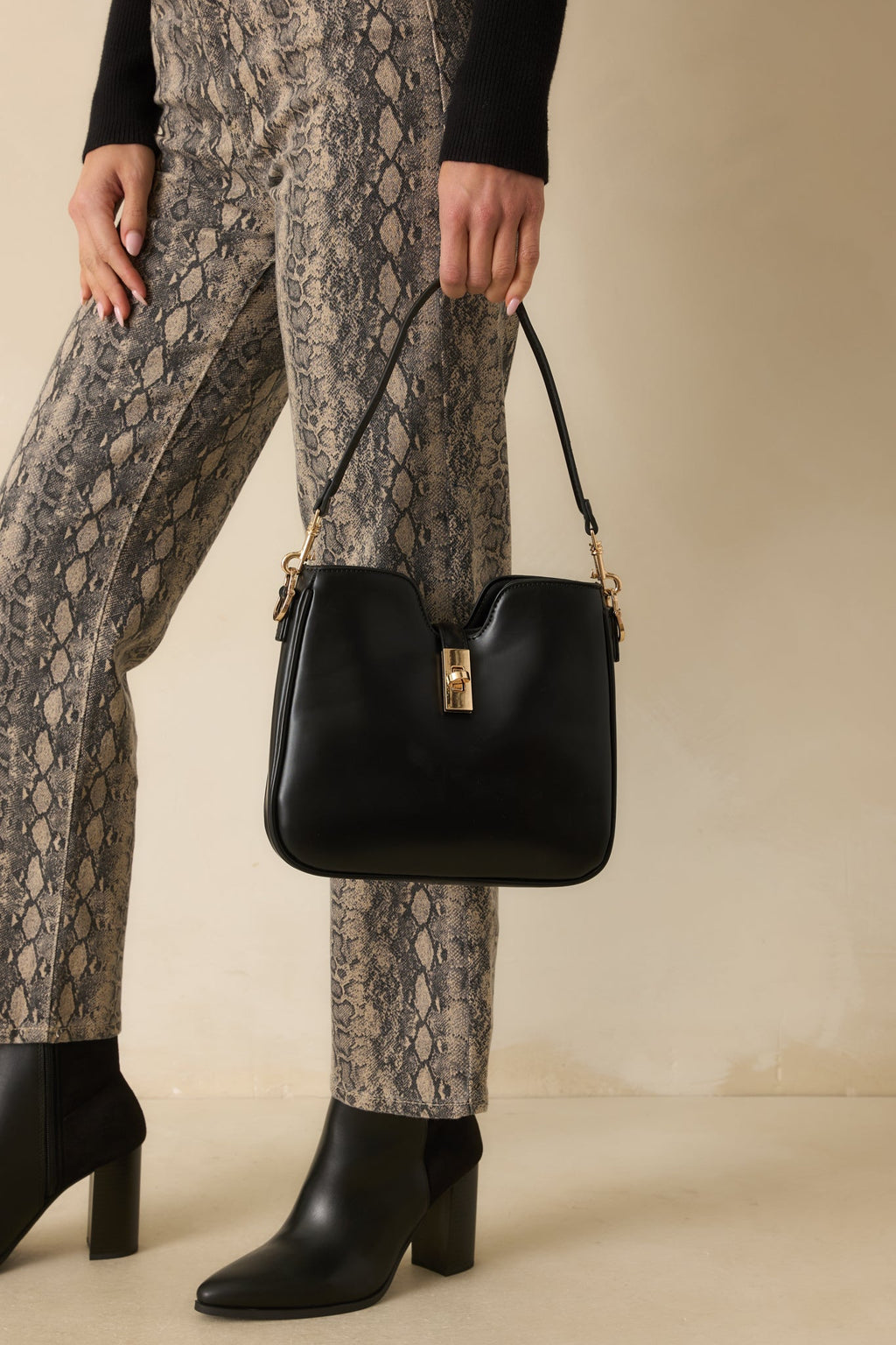 Might Surprise You Black Faux Leather Twist Lock Handbag