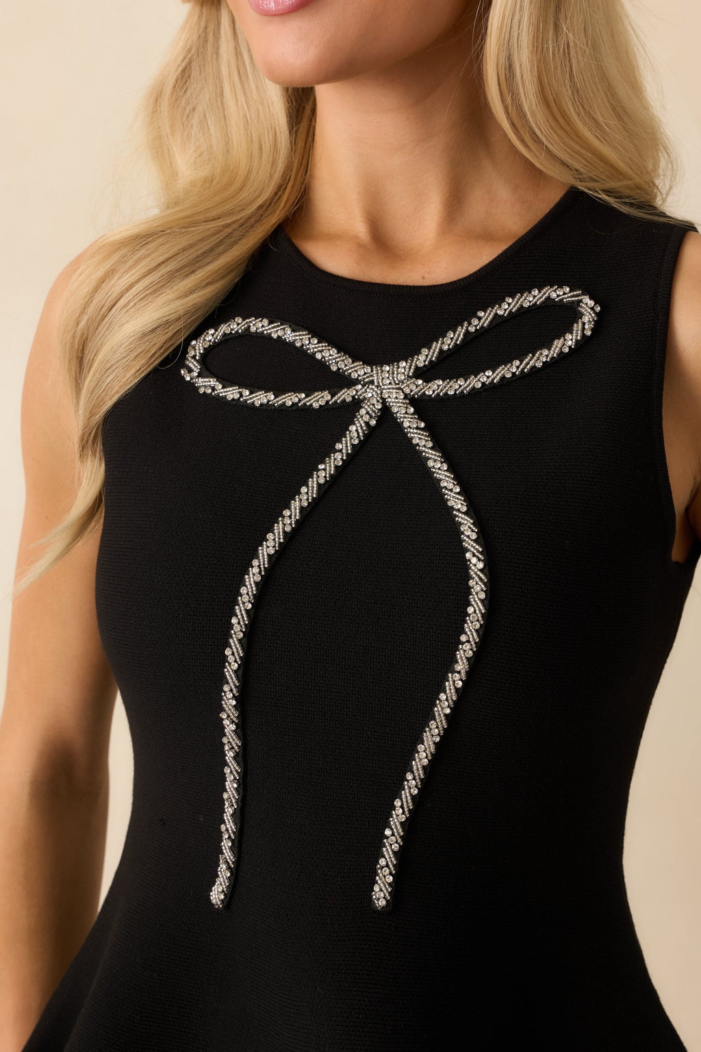 The Finishing Touch Black Sleeveless Beaded Bow Peplum Top